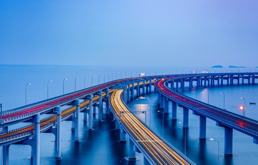 Long exposure photograph of vehicles on a bridge