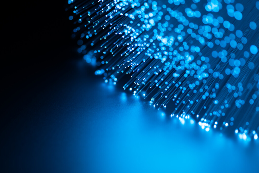 Illuminated Blue Colored Fiber Optics in Dark, Technology Concept.